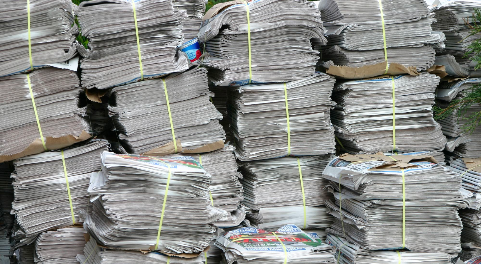 Multiple stacks of newspapers